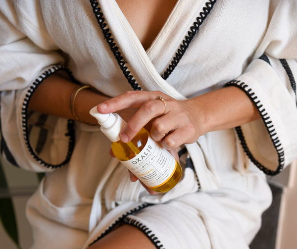 Cheyenne using our Louisa body oil, a mellow flower blend inspired by and made for strong women. Ylang ylang, clary sage, bergamot, and cedarwood.